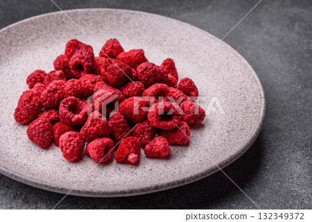 Dried sublimated slices of raspberry as an ingredient for sweet desserts. Dried raspberry Dried sublimated slices of raspberry as an ingredient for sweet desserts. Dried raspberry 132349372