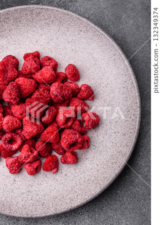Dried sublimated slices of raspberry as an ingredient for sweet desserts. Dried raspberry 132349374