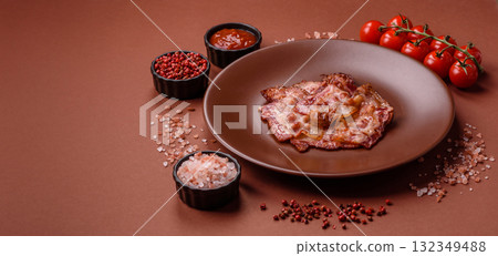 Cooked crispy fried pork bacon strips for a hearty breakfast. Fried bacon strips Cooked crispy fried pork bacon strips for a hearty breakfast. Fried bacon strips 132349488
