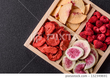 Box of dried fruits strawberries, raspberries, figs and peaches. Dried fruits Box of dried fruits strawberries, raspberries, figs and peaches. Dried fruits 132349691
