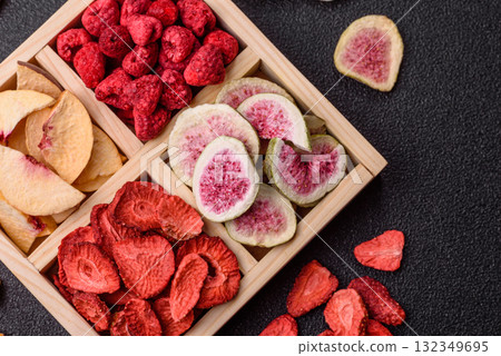 Box of dried fruits strawberries, raspberries, figs and peaches. Dried fruits Box of dried fruits strawberries, raspberries, figs and peaches. Dried fruits 132349695
