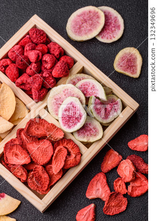 Box of dried fruits strawberries, raspberries, figs and peaches. Dried fruits Box of dried fruits strawberries, raspberries, figs and peaches. Dried fruits 132349696
