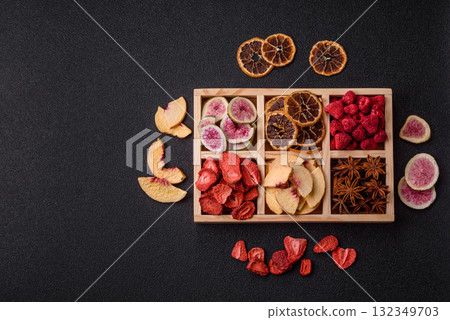 Box of dried fruits strawberries, raspberries, figs and peaches. Dried fruits Box of dried fruits strawberries, raspberries, figs and peaches. Dried fruits 132349703