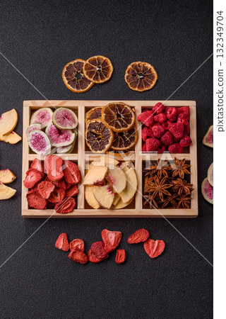 Box of dried fruits strawberries, raspberries, figs and peaches. Dried fruits Box of dried fruits strawberries, raspberries, figs and peaches. Dried fruits 132349704
