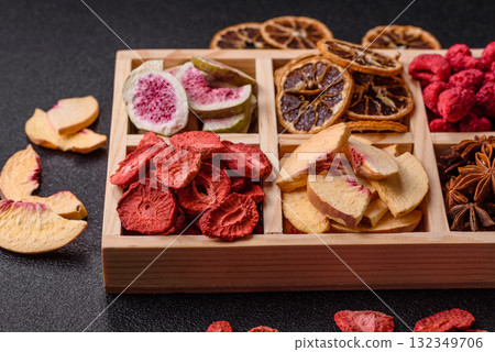 Box of dried fruits strawberries, raspberries, figs and peaches. Dried fruits 132349706