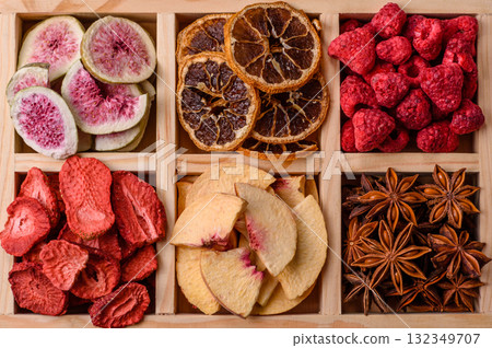 Box of dried fruits strawberries, raspberries, figs and peaches. Dried fruits Box of dried fruits strawberries, raspberries, figs and peaches. Dried fruits 132349707