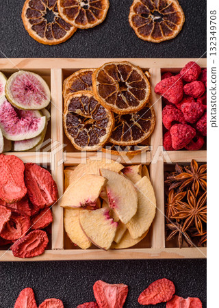 Box of dried fruits strawberries, raspberries, figs and peaches. Dried fruits 132349708