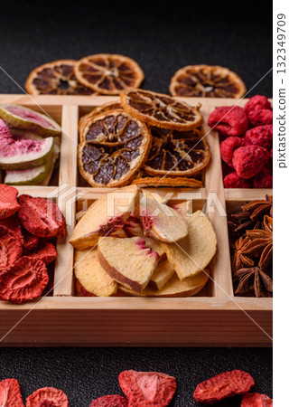 Box of dried fruits strawberries, raspberries, figs and peaches. Dried fruits Box of dried fruits strawberries, raspberries, figs and peaches. Dried fruits 132349709