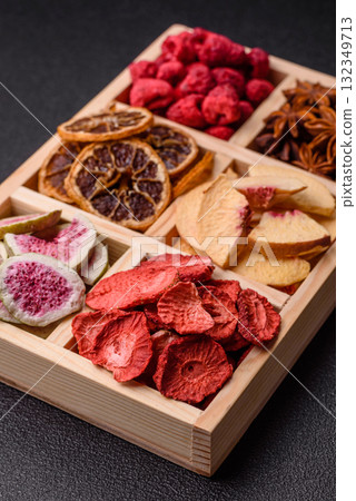Box of dried fruits strawberries, raspberries, figs and peaches. Dried fruits Box of dried fruits strawberries, raspberries, figs and peaches. Dried fruits 132349713