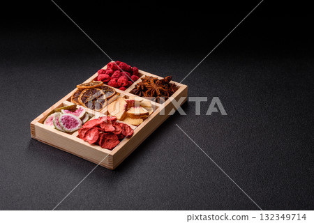 Box of dried fruits strawberries, raspberries, figs and peaches. Dried fruits Box of dried fruits strawberries, raspberries, figs and peaches. Dried fruits 132349714