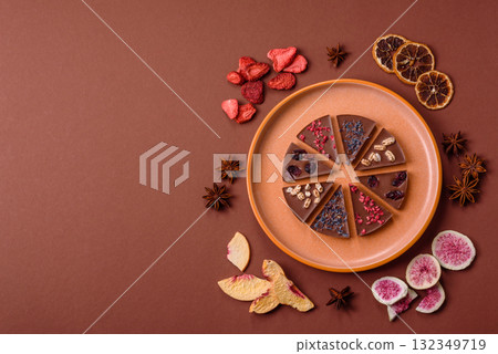 Craft home made chocolate with berries and fruits, delicious sweets. Craft chocolate Craft home made chocolate with berries and fruits, delicious sweets. Craft chocolate 132349719