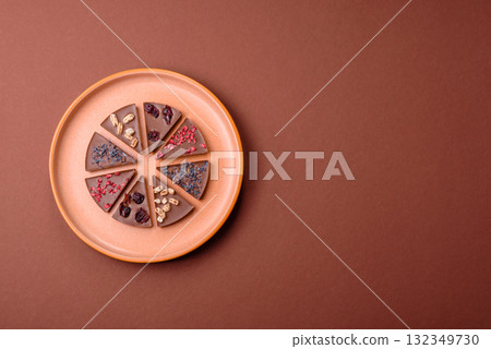 Craft home made chocolate with berries and fruits, delicious sweets. Craft chocolate Craft home made chocolate with berries and fruits, delicious sweets. Craft chocolate 132349730