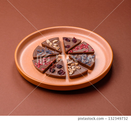 Craft home made chocolate with berries and fruits, delicious sweets. Craft chocolate Craft home made chocolate with berries and fruits, delicious sweets. Craft chocolate 132349732