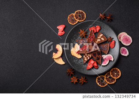 Craft home made chocolate with berries and fruits, delicious sweets. Craft chocolate Craft home made chocolate with berries and fruits, delicious sweets. Craft chocolate 132349734