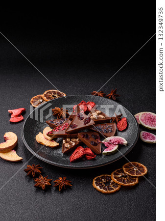 Craft home made chocolate with berries and fruits, delicious sweets. Craft chocolate Craft home made chocolate with berries and fruits, delicious sweets. Craft chocolate 132349736