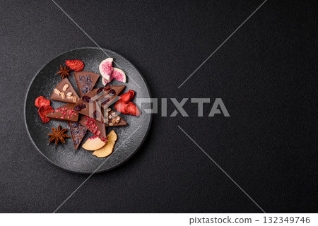 Craft home made chocolate with berries and fruits, delicious sweets. Craft chocolate Craft home made chocolate with berries and fruits, delicious sweets. Craft chocolate 132349746