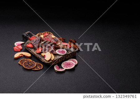 Craft home made chocolate with berries and fruits, delicious sweets. Craft chocolate Craft home made chocolate with berries and fruits, delicious sweets. Craft chocolate 132349761