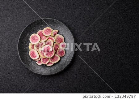 Dried sublimated fig slices as an ingredient for sweet desserts. Dried figs 132349787