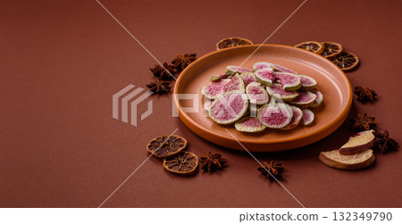 Dried sublimated fig slices as an ingredient for sweet desserts. Dried figs 132349790
