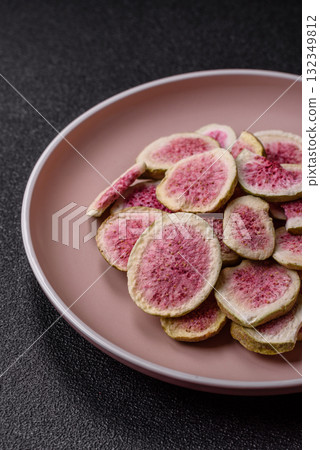 Dried sublimated fig slices as an ingredient for sweet desserts. Dried figs 132349812