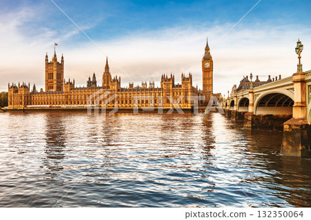 London cityscape with Houses of Parliament Elizabeth Tower and Westminster Bridge over River Thames 132350064