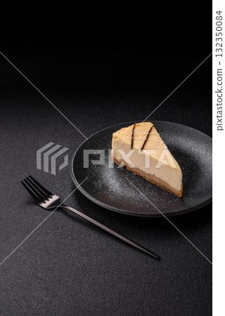 A piece of sweet New York cheesecake, dessert, cheese and vanilla pie. Classic cheesecake 132350084