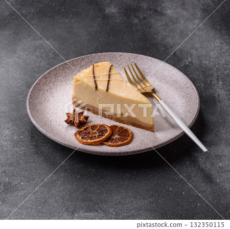 A piece of sweet New York cheesecake, dessert, cheese and vanilla pie. Classic cheesecake 132350115