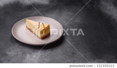 A piece of sweet New York cheesecake, dessert, cheese and vanilla pie. Classic cheesecake 132350123