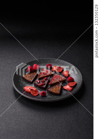 Craft home made chocolate with berries and fruits, delicious sweets. Craft chocolate 132350129