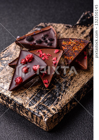 Craft home made chocolate with berries and fruits, delicious sweets. Craft chocolate 132350145