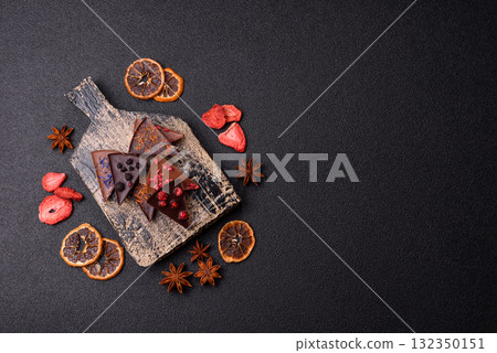 Craft home made chocolate with berries and fruits, delicious sweets. Craft chocolate Craft home made chocolate with berries and fruits, delicious sweets. Craft chocolate 132350151