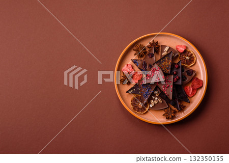 Craft home made chocolate with berries and fruits, delicious sweets. Craft chocolate Craft home made chocolate with berries and fruits, delicious sweets. Craft chocolate 132350155