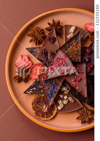 Craft home made chocolate with berries and fruits, delicious sweets. Craft chocolate Craft home made chocolate with berries and fruits, delicious sweets. Craft chocolate 132350160