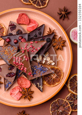 Craft home made chocolate with berries and fruits, delicious sweets. Craft chocolate 132350164