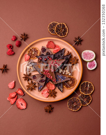 Craft home made chocolate with berries and fruits, delicious sweets. Craft chocolate Craft home made chocolate with berries and fruits, delicious sweets. Craft chocolate 132350168