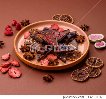 Craft home made chocolate with berries and fruits, delicious sweets. Craft chocolate Craft home made chocolate with berries and fruits, delicious sweets. Craft chocolate 132350169