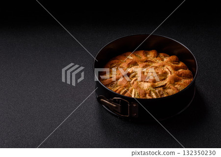 Apple or pear sweet pie for Halloween, hot baking in autumn. Apple pie 132350230