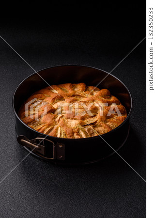 Apple or pear sweet pie for Halloween, hot baking in autumn. Apple pie Apple or pear sweet pie for Halloween, hot baking in autumn. Apple pie 132350233