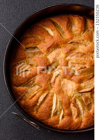Apple or pear sweet pie for Halloween, hot baking in autumn. Apple pie Apple or pear sweet pie for Halloween, hot baking in autumn. Apple pie 132350236