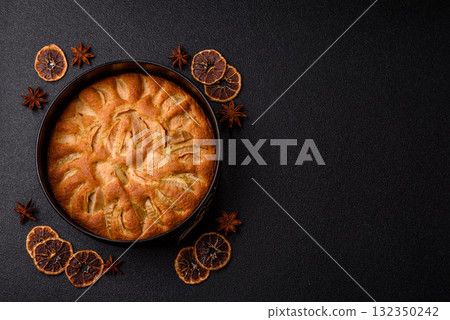 Apple or pear sweet pie for Halloween, hot baking in autumn. Apple pie Apple or pear sweet pie for Halloween, hot baking in autumn. Apple pie 132350242