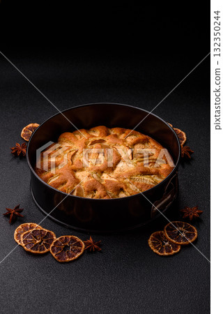 Apple or pear sweet pie for Halloween, hot baking in autumn. Apple pie Apple or pear sweet pie for Halloween, hot baking in autumn. Apple pie 132350244