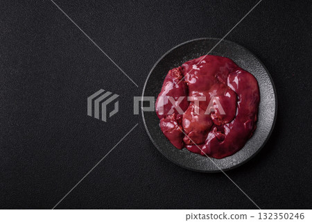 Raw fresh chicken or turkey liver, internal offal of poultry. Raw chicken liver Raw fresh chicken or turkey liver, internal offal of poultry. Raw chicken liver 132350246