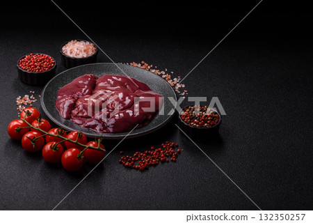 Raw fresh chicken or turkey liver, internal offal of poultry. Raw chicken liver Raw fresh chicken or turkey liver, internal offal of poultry. Raw chicken liver 132350257