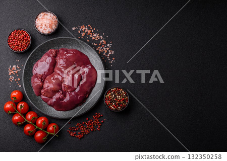 Raw fresh chicken or turkey liver, internal offal of poultry. Raw chicken liver Raw fresh chicken or turkey liver, internal offal of poultry. Raw chicken liver 132350258