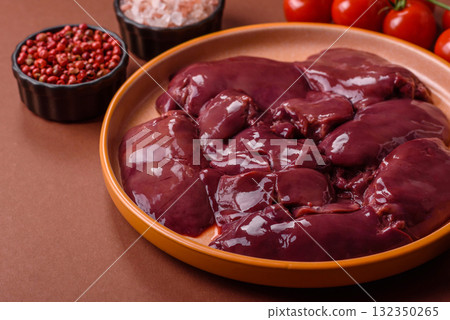 Raw fresh chicken or turkey liver, internal offal of poultry. Raw chicken liver Raw fresh chicken or turkey liver, internal offal of poultry. Raw chicken liver 132350265