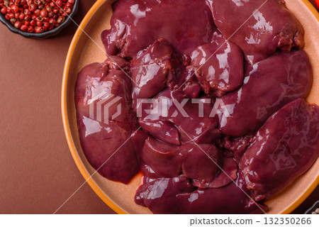 Raw fresh chicken or turkey liver, internal offal of poultry. Raw chicken liver Raw fresh chicken or turkey liver, internal offal of poultry. Raw chicken liver 132350266