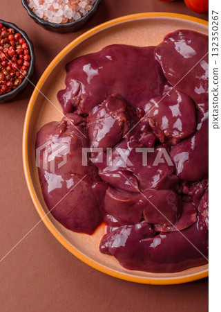 Raw fresh chicken or turkey liver, internal offal of poultry. Raw chicken liver 132350267