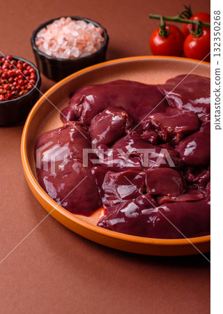 Raw fresh chicken or turkey liver, internal offal of poultry. Raw chicken liver 132350268