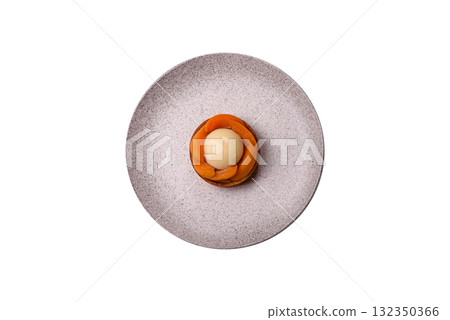 Pie, sweet round tart with apricot pieces, cream and nuts. Sweet tart with peach 132350366