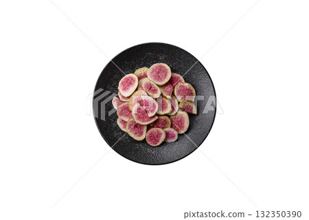 Dried sublimated fig slices as an ingredient for sweet desserts. Dried figs Dried sublimated fig slices as an ingredient for sweet desserts. Dried figs 132350390